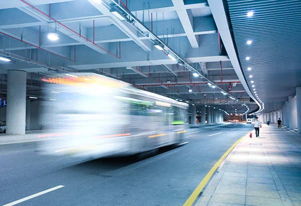 Bus driving through tunnel